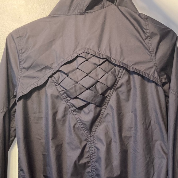 Ivivva, black zip up wind breaker. - Picture 3 of 4